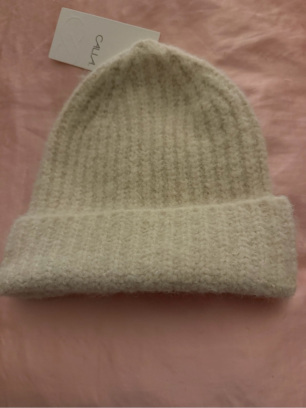 The Calia Women’s Beanie Fold Up Brim Hat in red is a stylish accessory for wome